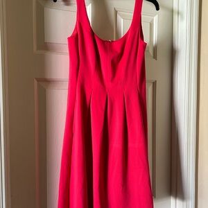 Nine West. Size 2. Red sleeveless dress with pockets and snap for bra straps.